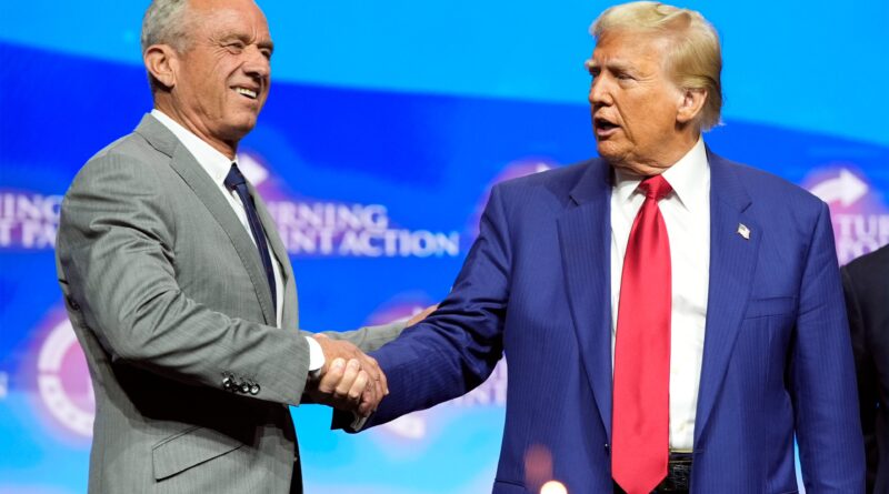 Republican presidential nominee former President Donald Trump shakes hands with Robert F. Kennedy Jr. during a meeting held in Duluth, Georgia, last month. Kennedy said over the weekend he would 'advise all US water systems to remove fluoride from public water.'